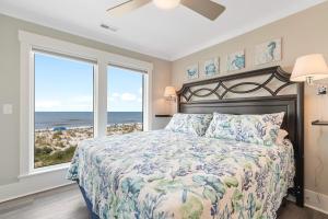 En eller flere senge i et værelse på Ocean's Edge + 63 billeder