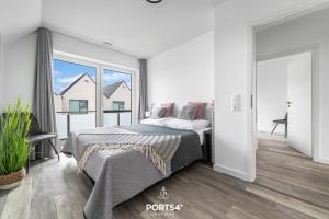 Ένα ή περισσότερα κρεβάτια σε δωμάτιο στο Ferienhaus Waidla-Huus