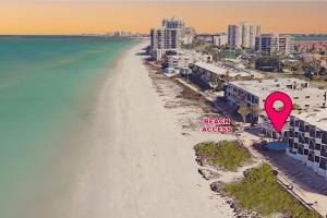 an aerial view of a beach with a red marker at Emerald at Belleair Beach Club in Clearwater Beach