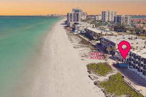 an aerial view of a beach with a red marker at Emerald on the Water - Formerly Belleair Beach Club in Clearwater Beach