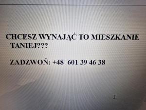 etykieta na stronie laptopa w obiekcie Apartament SYNERGIA w Łodzi