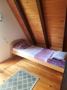 Postel nebo postele na pokoji v ubytování Kućica na Tari