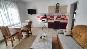 Posezení v ubytování Apartment Tina Gračac