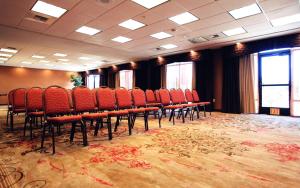 a room with rows of chairs in a conference room at Hampton Inn & Suites Paso Robles in Paso Robles