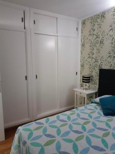 Ένα ή περισσότερα κρεβάτια σε δωμάτιο στο Apartamento Victor Arico