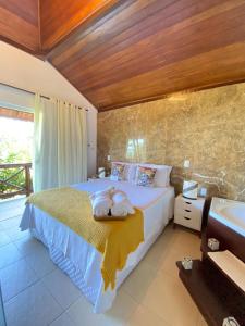 Postel nebo postele na pokoji v ubytování Charme Pousada Boutique & Spa + 37 fotografií