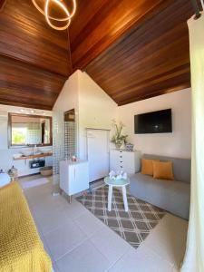 TV a/nebo společenská místnost v ubytování Charme Pousada Boutique & Spa