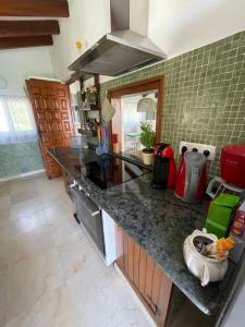 A kitchen or kitchenette at Casa Puput