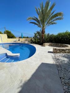 The swimming pool at or close to Casa Puput
