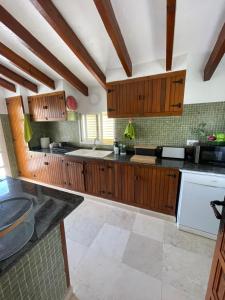 A kitchen or kitchenette at Casa Puput