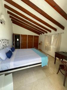 A bed or beds in a room at Casa Puput