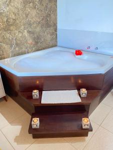 Postel nebo postele na pokoji v ubytování Charme Pousada Boutique & Spa