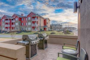 a balcony with two bbqs and a grill at Home2 Suites By Hilton Rock Hill in Rock Hill