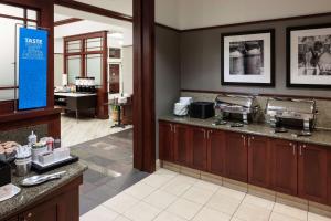 A kitchen or kitchenette at Hampton Inn & Suites Oklahoma City-Bricktown