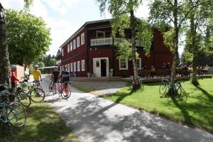a group of people on bikes in front of a building at Hotel Dalhem in Dalhem +16 photos