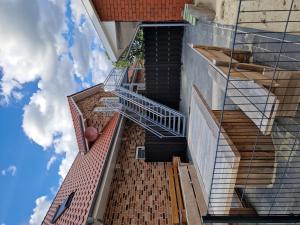 a set of stairs leading up to a building at Wohnung 1 - a90070 in Haselünne