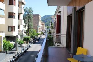 a view of a street from a balcony of a building at La Casa dei colori in Vico Equense