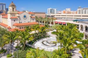 an aerial view of a city with palm trees at DoubleTree by Hilton Hotel West Palm Beach Airport in West Palm Beach