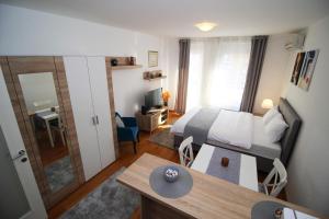 Postel nebo postele na pokoji v ubytování Bizmark accommodation A blok