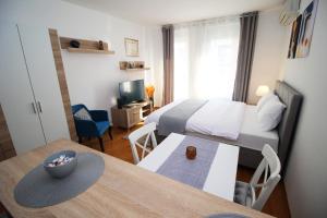 Postel nebo postele na pokoji v ubytování Bizmark accommodation A blok