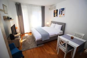 Postel nebo postele na pokoji v ubytování Bizmark accommodation A blok