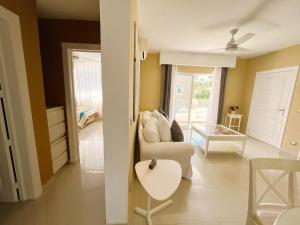 Posezení v ubytování Beauty Orquidea 2bed apartment in El Cortecito Playa Bavaro