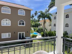 Výhled na bazén z ubytování Beauty Orquidea 2bed apartment in El Cortecito Playa Bavaro nebo okolí