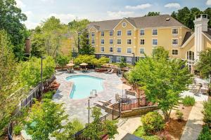 an aerial view of a hotel with a swimming pool at Homewood Suites by Hilton Raleigh/Cary in Cary