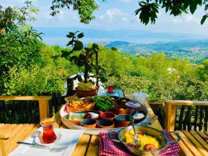a table with a tray of food on a table at Phalesia Glamping Otel in Sapanca