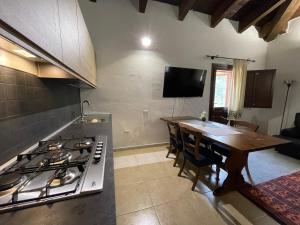 Kuchyň nebo kuchyňský kout v ubytování S'Abba Druche rooms