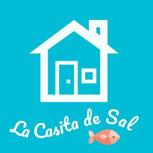 uma casita ser sinal seguro com uma casa e um peixe em "La Casita de Sal" cerca de la playa, con piscina comunitaria y wifi em La Herradura