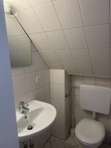 Koupelna v ubytování Dünenhaus Zimmer
