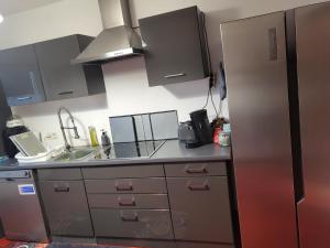 Η κουζίνα ή μικρή κουζίνα στο Ferienwohnung Freudenberg +4 φωτογραφίες