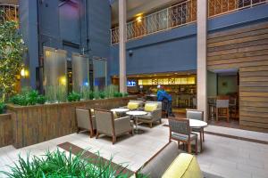 A seating area at Embassy Suites by Hilton Denver Central Park