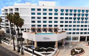 a rendering of the exterior of the hotel at Hilton Santa Monica in Los Angeles