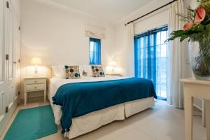Katil atau katil-katil dalam bilik di Martinhal Quinta Family Resort +50 gambar
