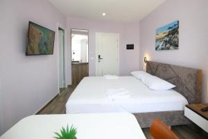Voodi või voodid majutusasutuse Queen Apartmets Vlore toas