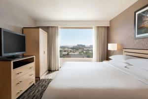 Postel nebo postele na pokoji v ubytování Embassy Suites by Hilton Convention Center Las Vegas