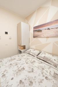 Postel nebo postele na pokoji v ubytování Lullaby B&B