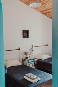 Кровать или кровати в номере Casa Margarida