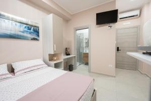 Postel nebo postele na pokoji v ubytování Lullaby B&B