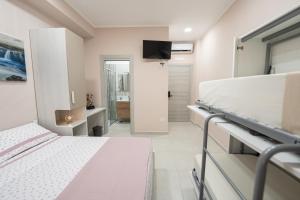 Postel nebo postele na pokoji v ubytování Lullaby B&B