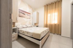 Postel nebo postele na pokoji v ubytování Lullaby B&B