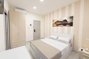 Postel nebo postele na pokoji v ubytování Lullaby B&B