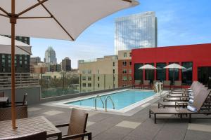 a swimming pool on the roof of a building at Homewood Suites by Hilton Austin Downtown in Austin
