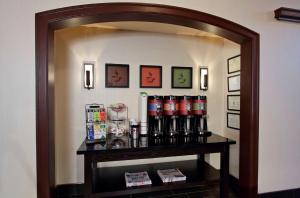 a shelf in a room with a mirror at Hampton Inn & Suites Newtown in Yardley