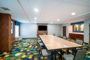 a conference room with a large table and chairs at Hampton Inn Bardstown in Bardstown