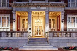 a front door of a house with stairs at Hampton Inn & Suites Birmingham-Downtown-Tutwiler in Birmingham