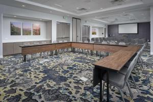 a conference room with desks and chairs and a screen at Hampton Inn Ashland City, Tn in Ashland City +26 photos