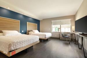 Tru By Hilton Meridian Boise West Id客房内的一张或多张床位